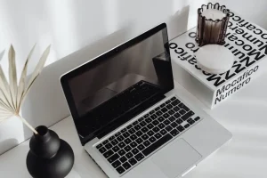 Laptop on a desk representing advance booking planning
